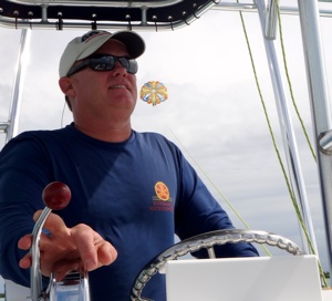 George Shattuck is as much at the helm of running Sundance Watersports as he is the parasailing adventure boat, guiding the daily enjoyment of Middle Keys visitors. Images courtesy of Sundance Watersports